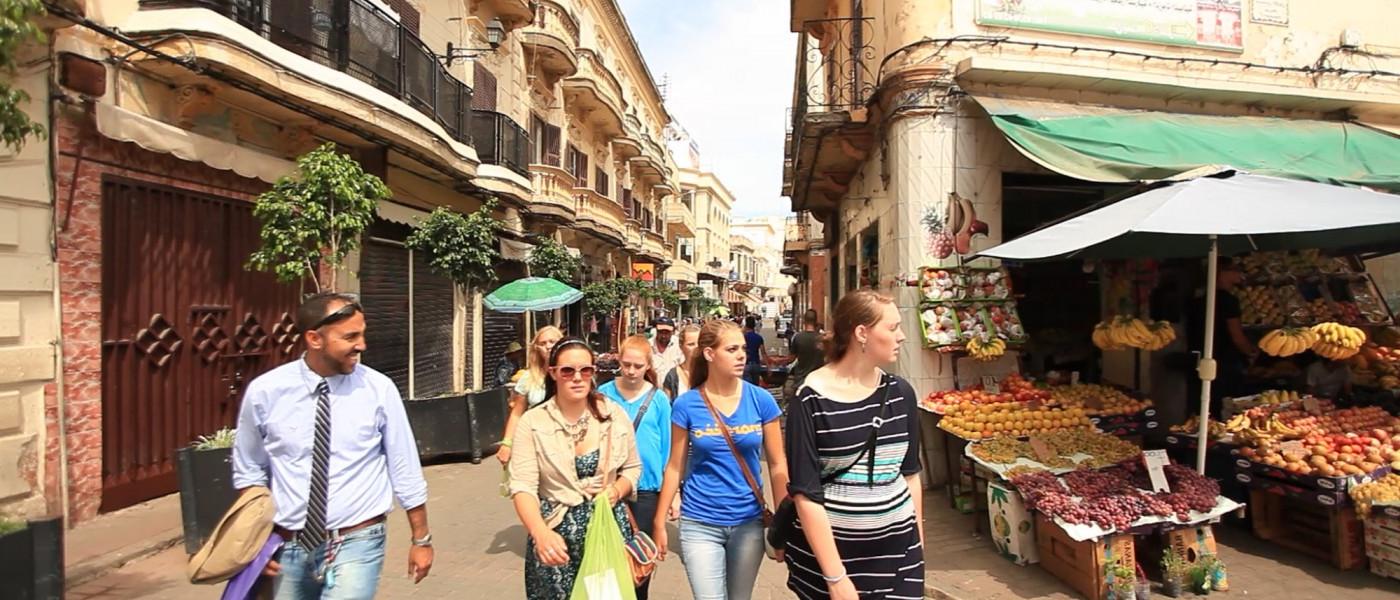Students walking together through the streets of Tangier.